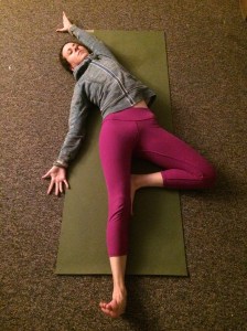 Bend your right leg so your foot touches the inside of your left thigh and your right knee splays out. Reach your right arm up and over towards the left side of your mat. 