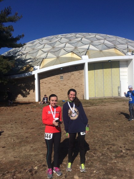 Lizzy and I at the finish of the Holy Half with our medals! 